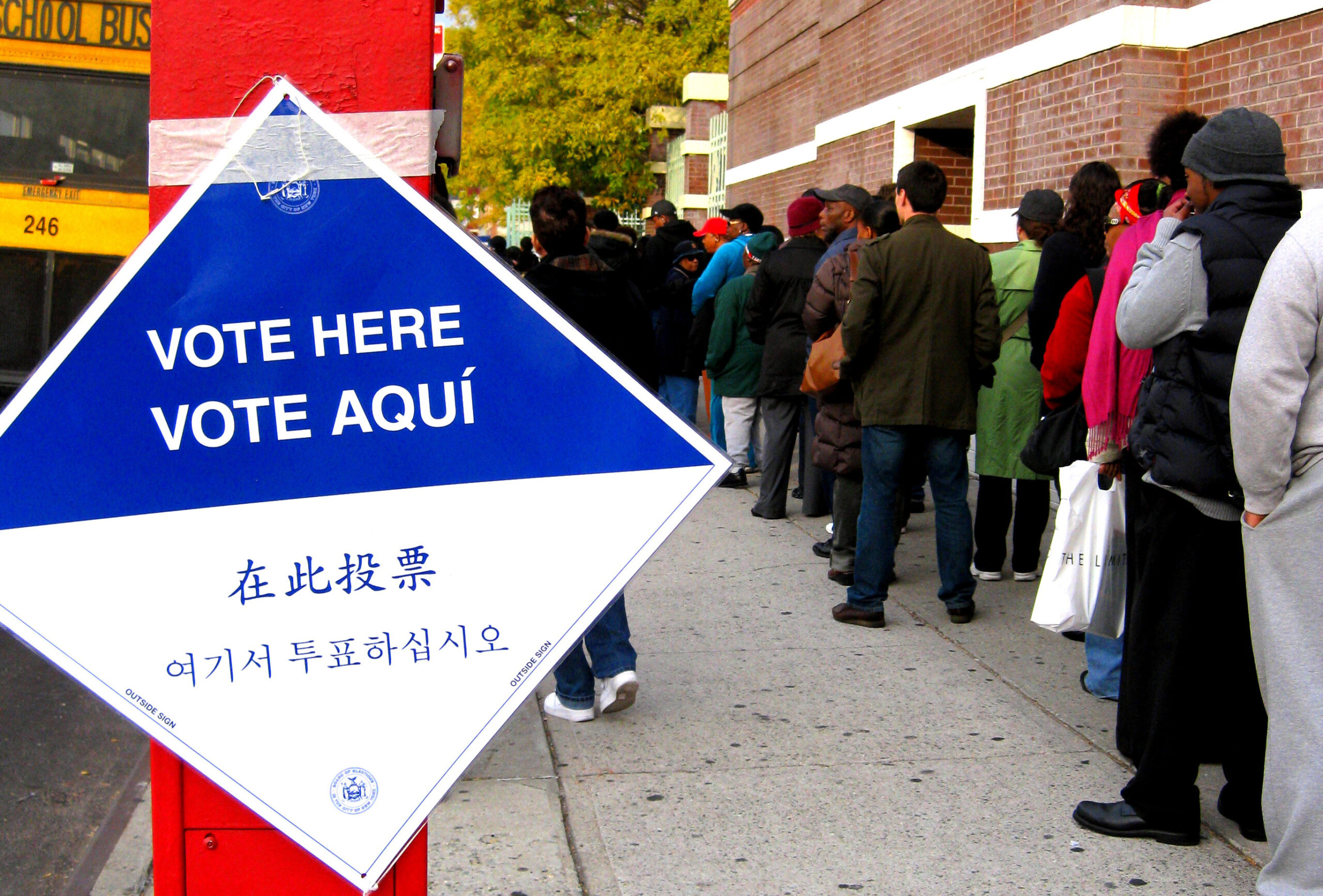 Photo of New Yorkers in Brooklyn waiting on long lines to vote in the 2008 presidential election.